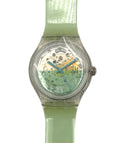 Green wristwatch with transparent case on a white background