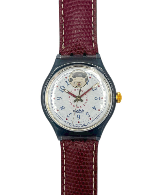 Watch with a brown strap on a white background