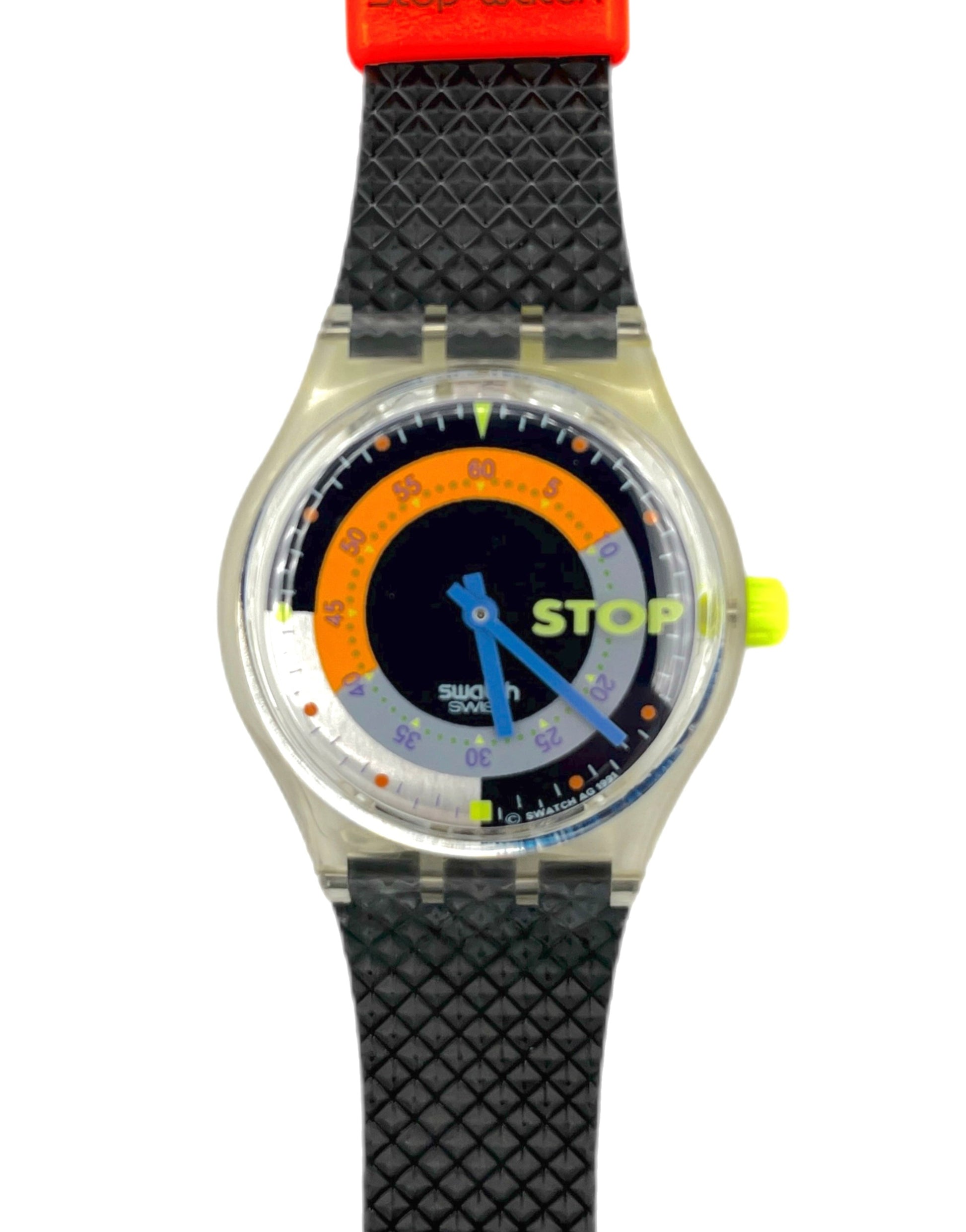 Swatch watch with black strap and colorful face on a white background