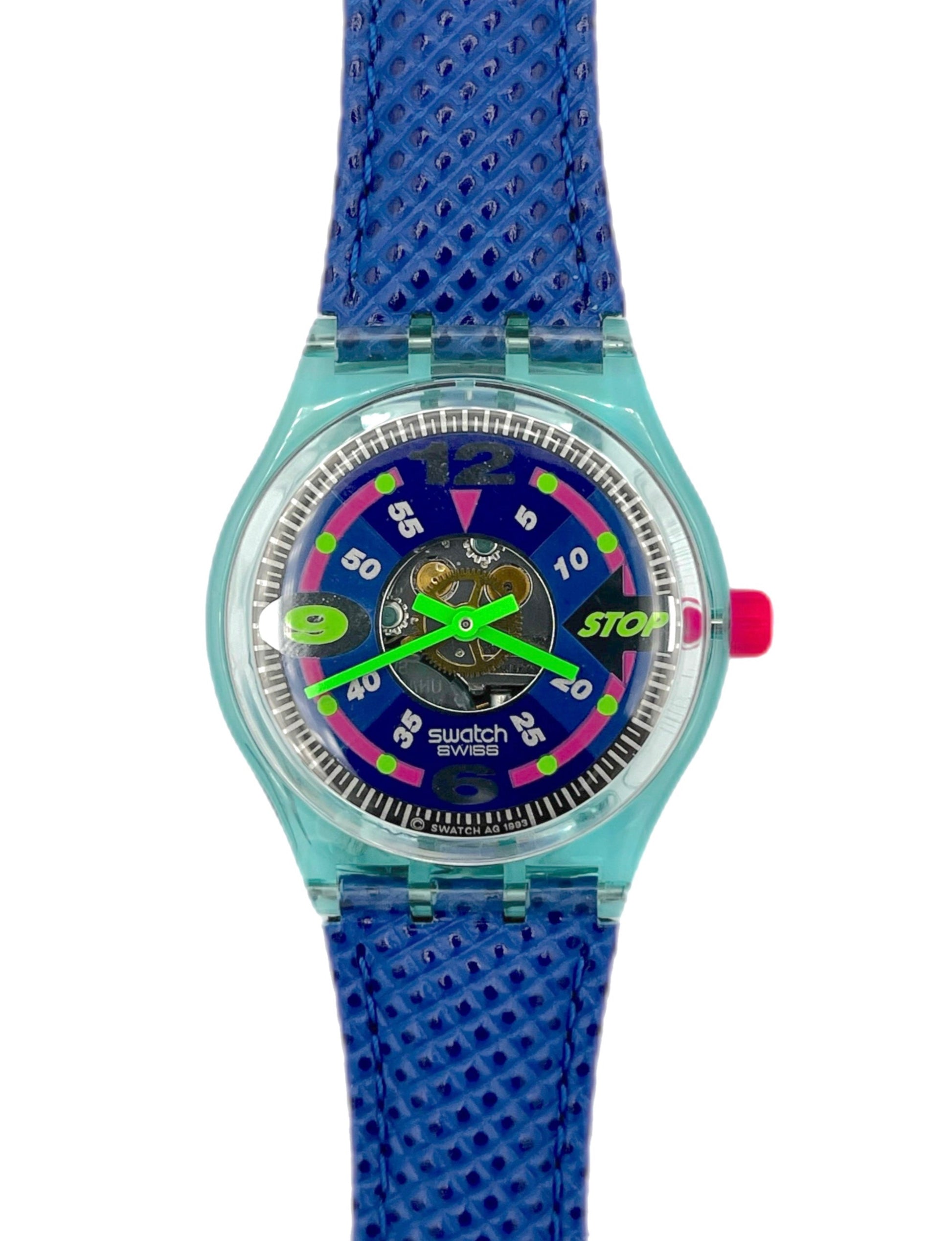 Watch with blue strap and colorful face on a white background