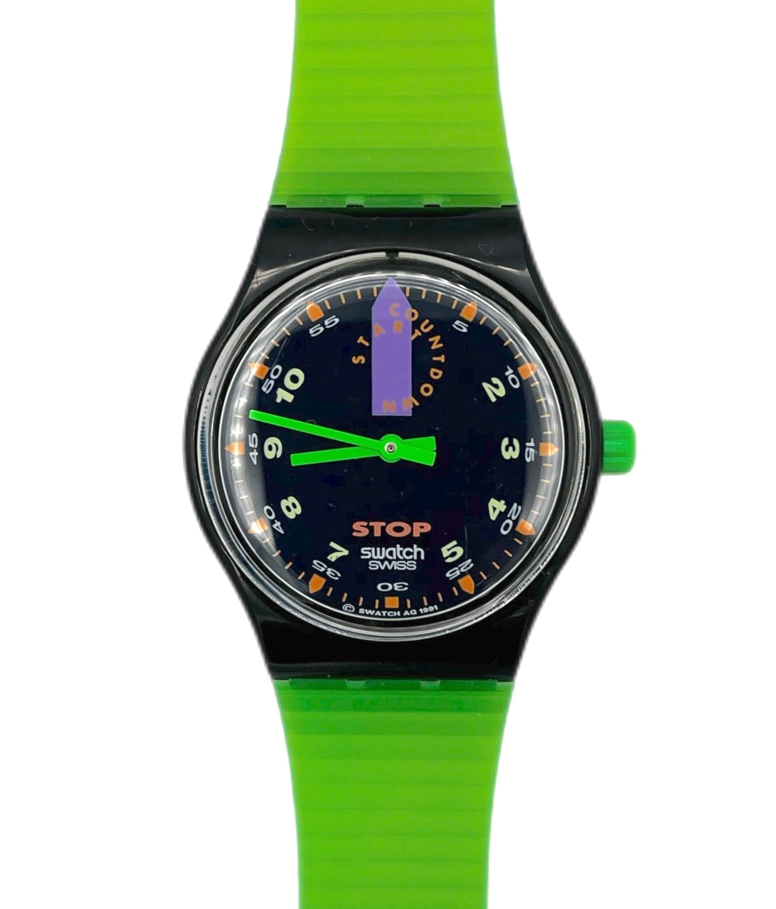 Swatch watch with green strap and black dial on a white background