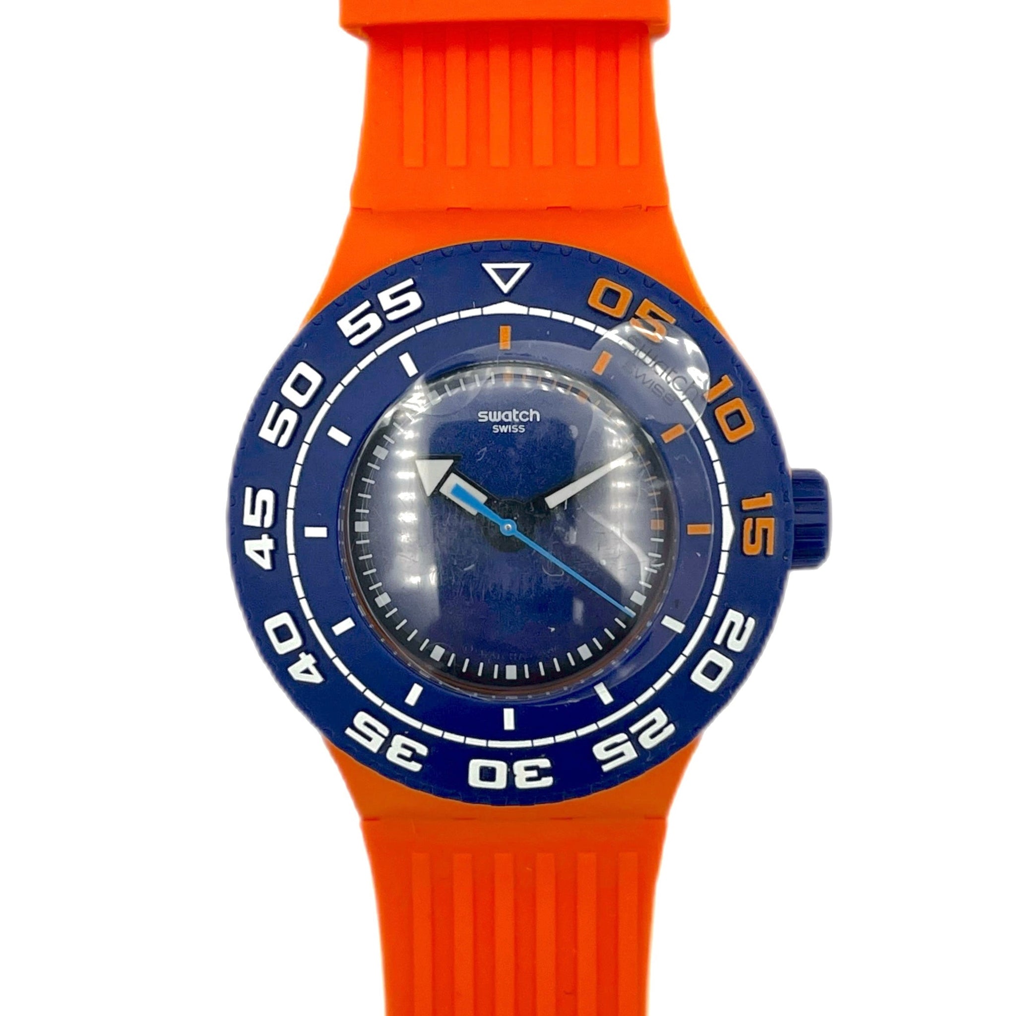 Orange watch with a blue face on a white background