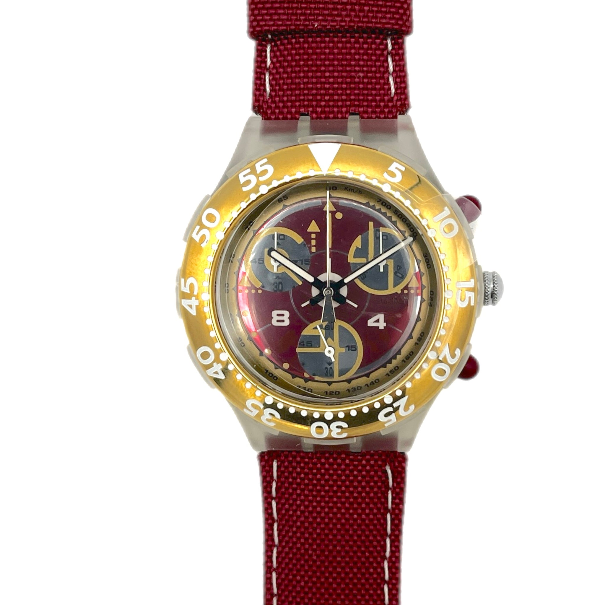 Wristwatch with red strap and gold case on a white background
