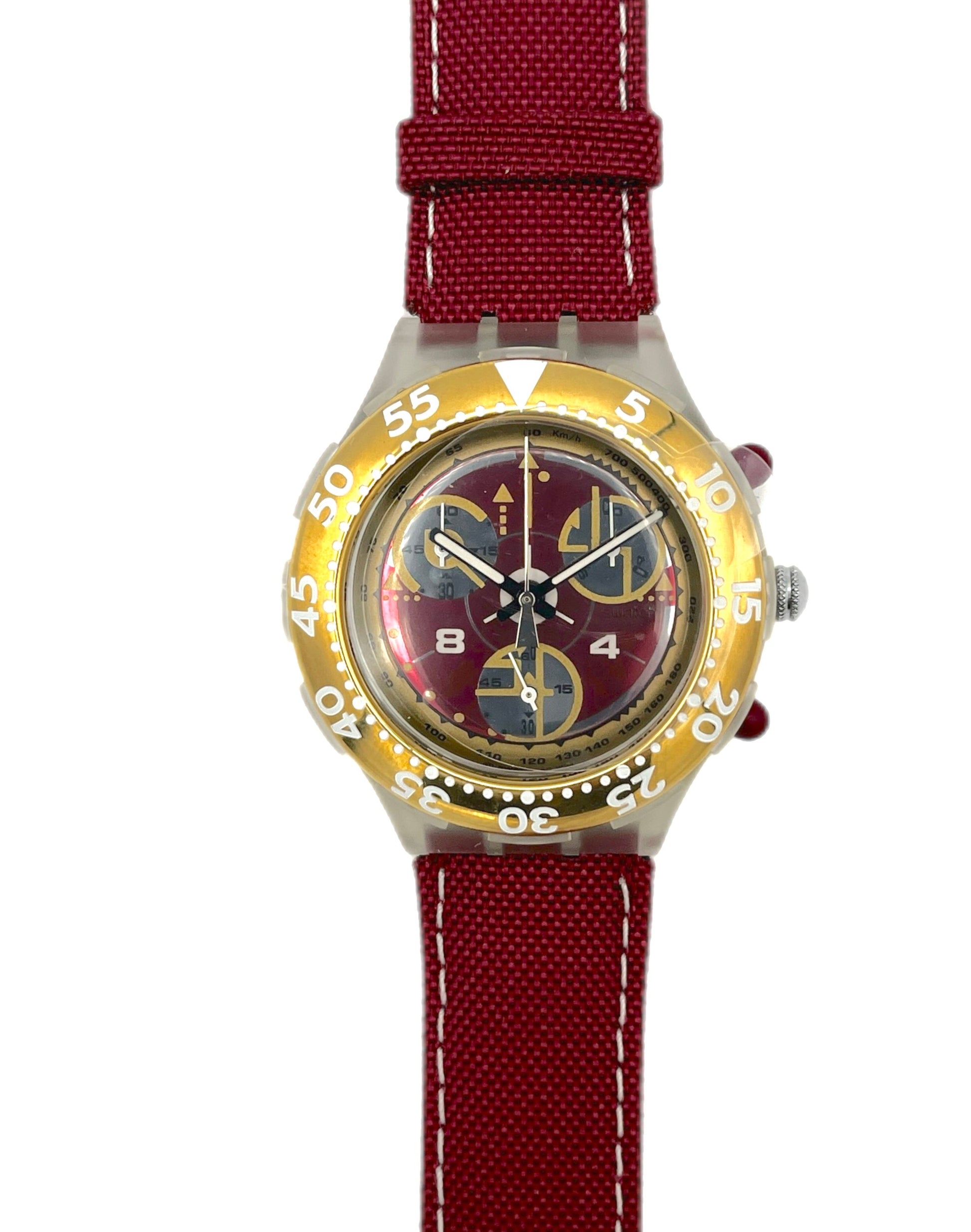 Wristwatch with red strap and gold case on a white background