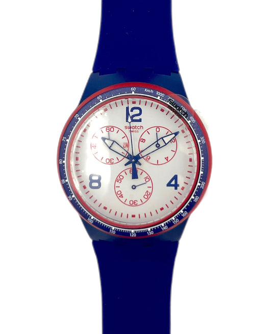 Swatch watch with blue strap and white face on a white background