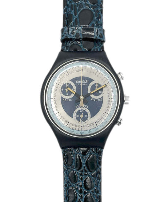 Swatch watch with a dark blue strap on a white background