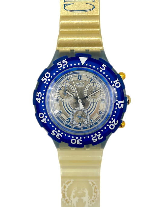 Wristwatch with blue dial and gold accents on a white background