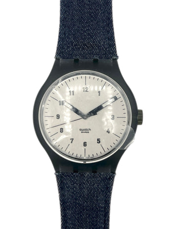 Watch with a blue denim strap on a white background