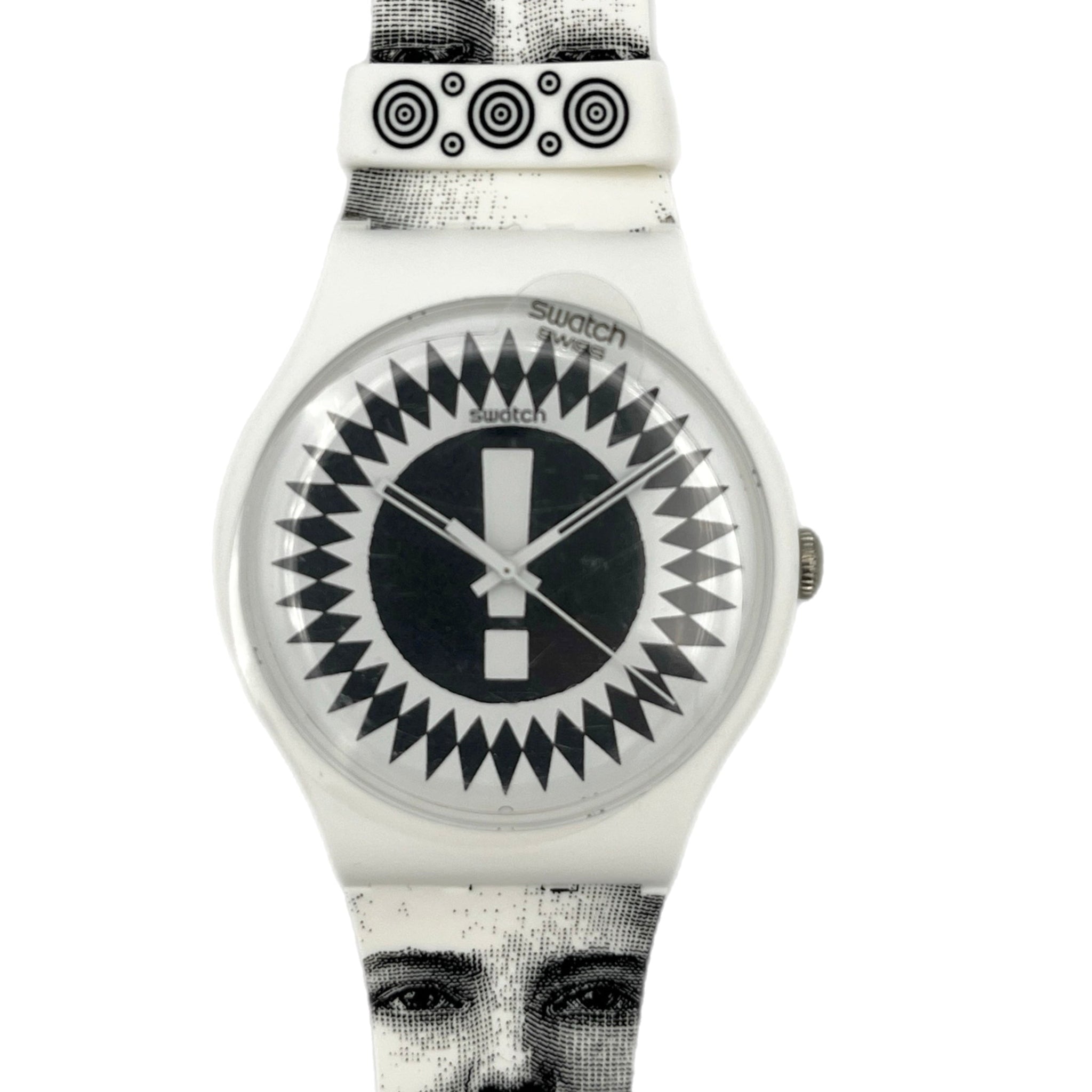 Watch with black and white patterned strap and face on a white background