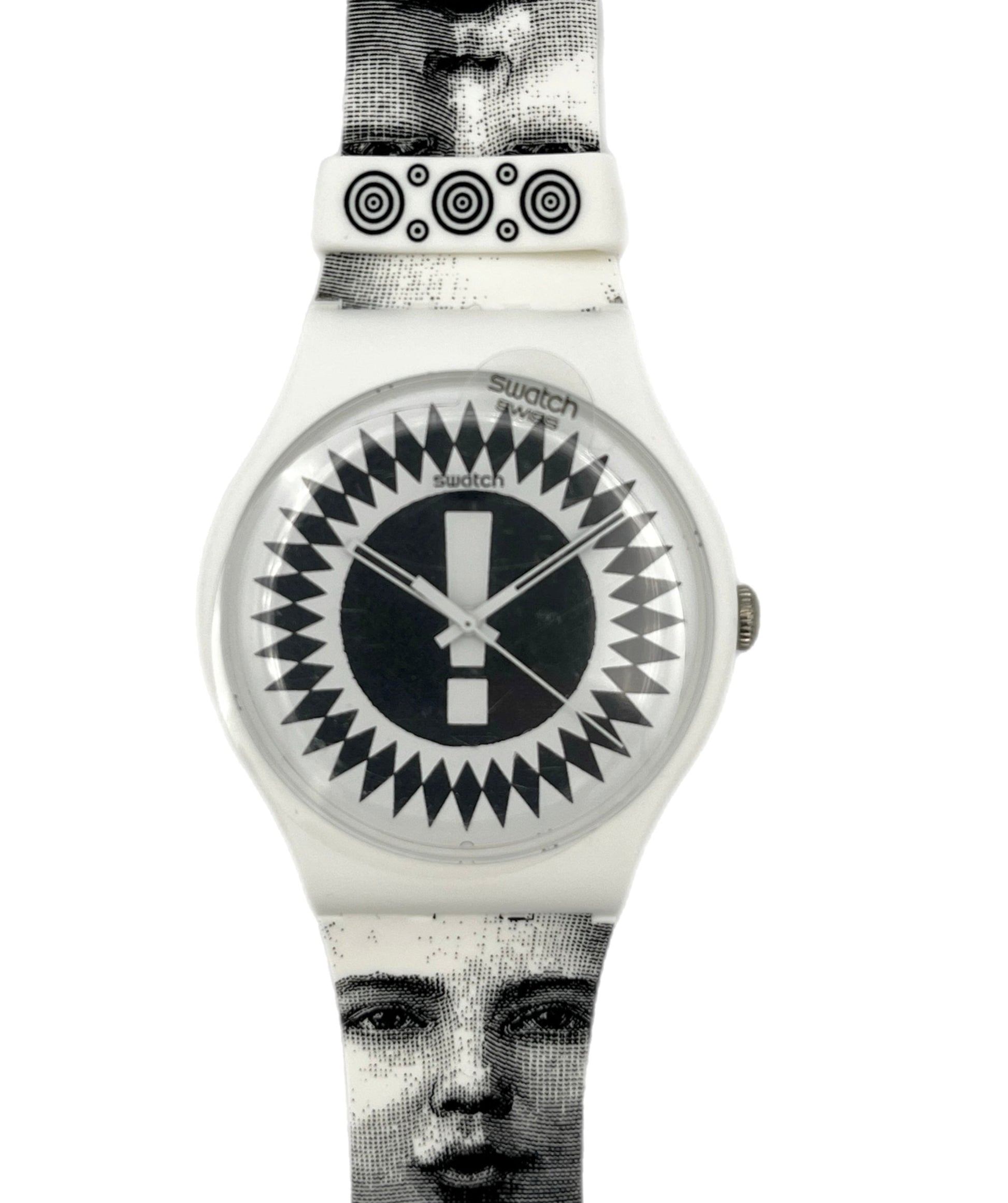 Watch with black and white patterned strap and face on a white background