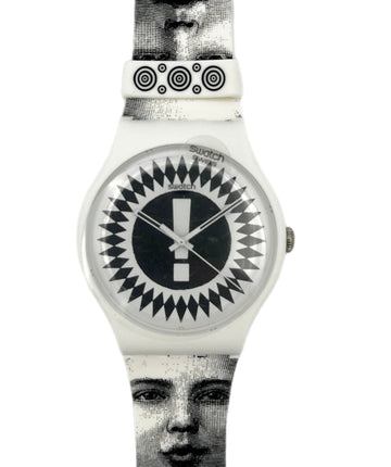 Watch with black and white patterned strap and face on a white background