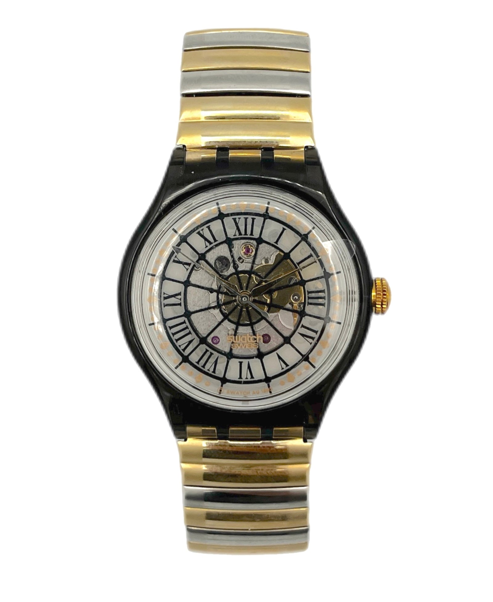 Two-tone gold and black watch with a white face on a white background
