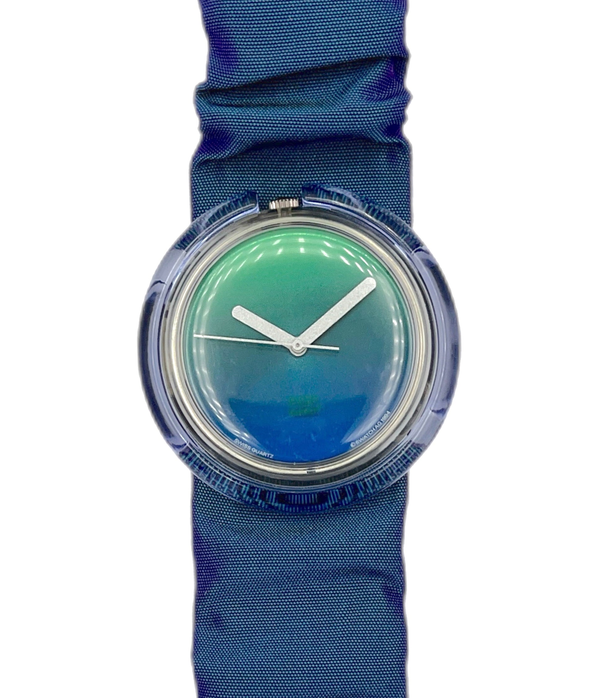 Wristwatch with blue strap and green face on a white background