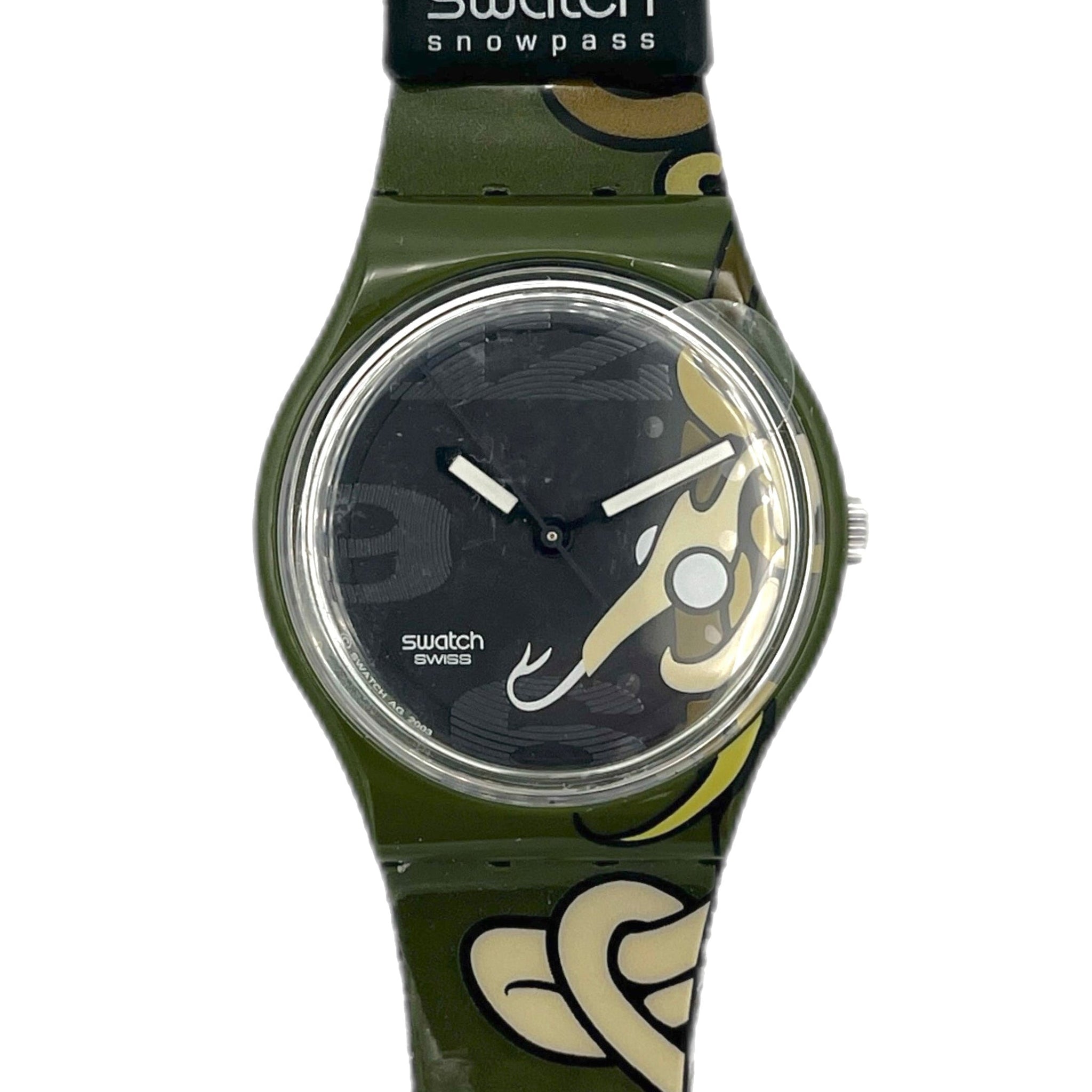 Swatch watch with green strap and black face on a white background