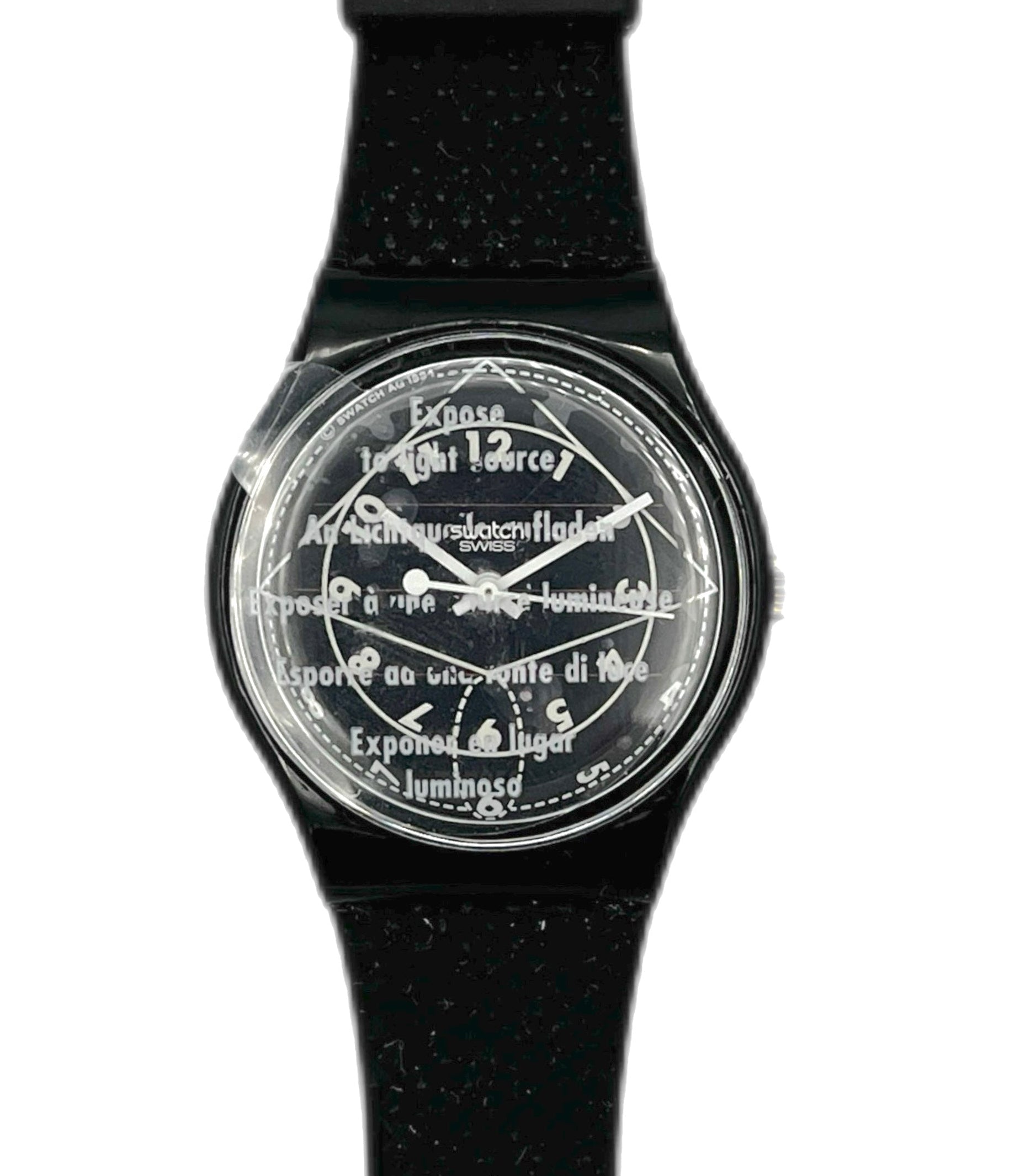 Black watch with a transparent face displaying text on a white background