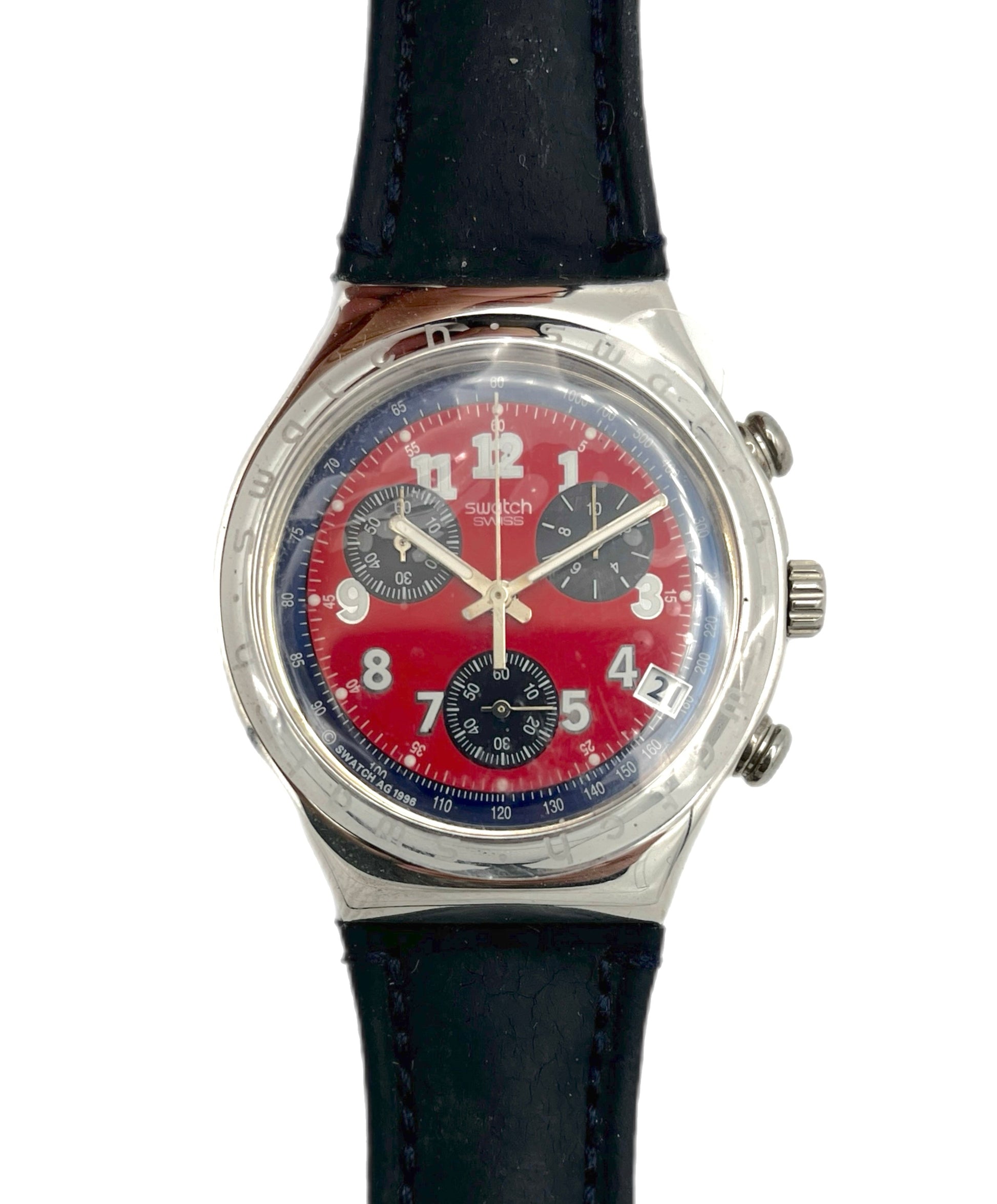 Wristwatch with a red face and black leather strap on a white background