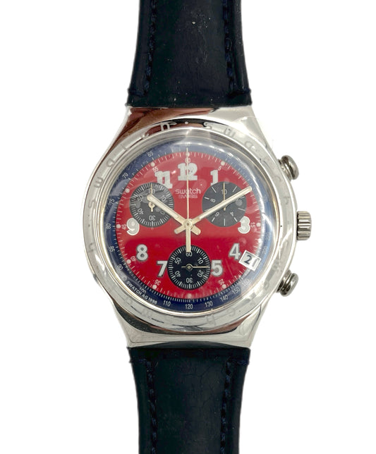 Wristwatch with a red face and black leather strap on a white background