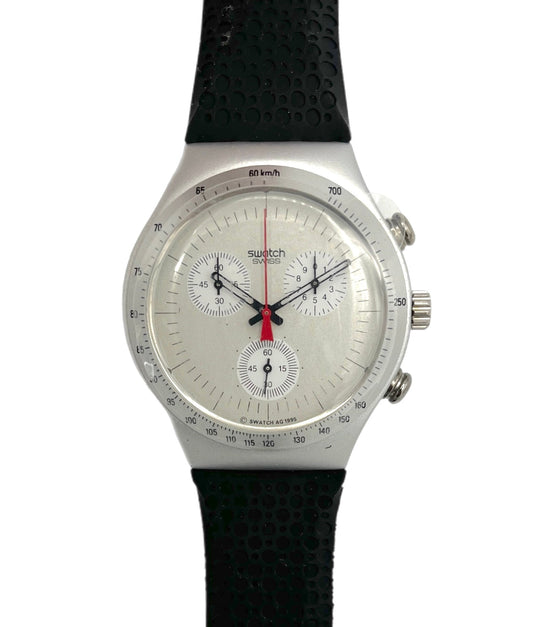 Swatch watch with black strap and silver case on a white background