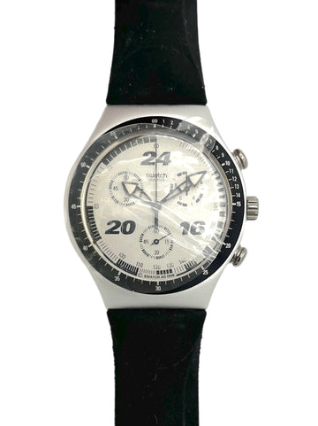 Swatch watch with black strap and white face on a white background