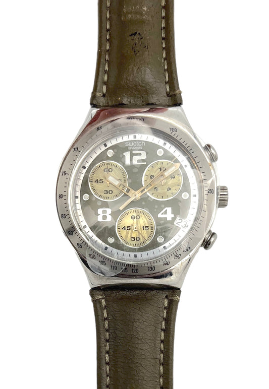 Watch with a brown leather strap and silver case on a white background