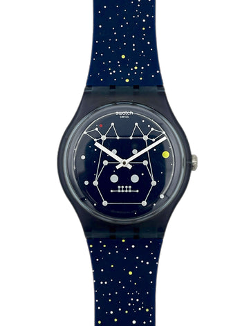 Swatch watch with starry night design on a white background