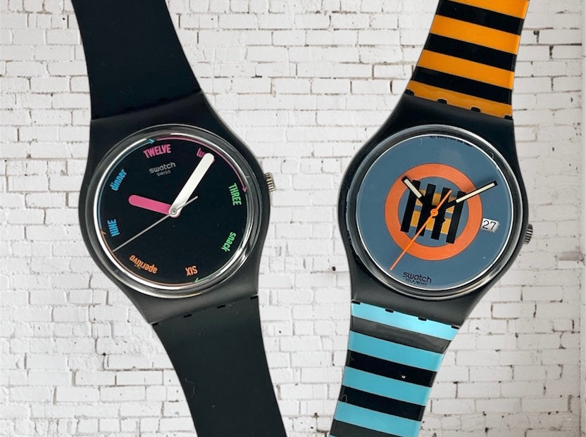 A new, unopened replacement band for a Pop Swatch watch, featuring a vibrant orange textile strap with a matching orange dial, packaged in a clear plastic case.