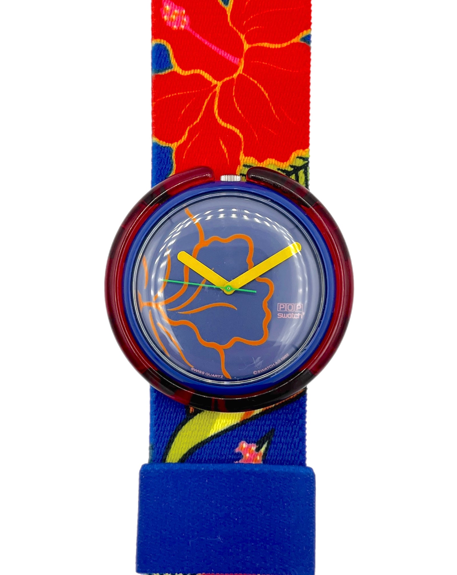 Watch with a colorful strap featuring floral designs on a white background