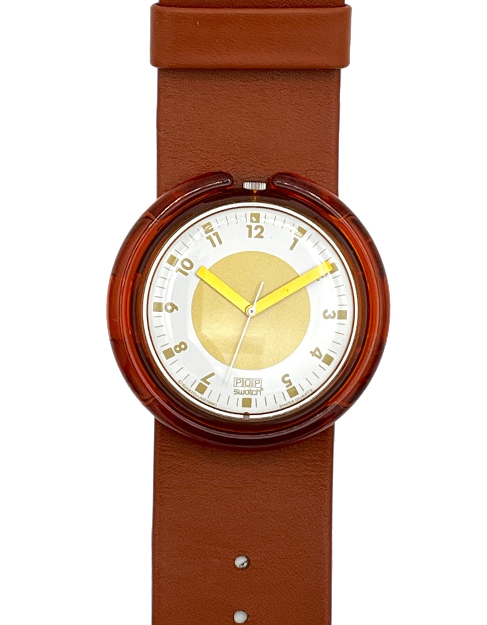 A Swatch wristwatch featuring a brown leather strap, a translucent reddish-brown circular case, and a white dial with gold-tone hands and numerals.