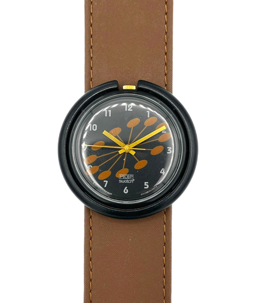 Watch with brown strap and black dial on a white background