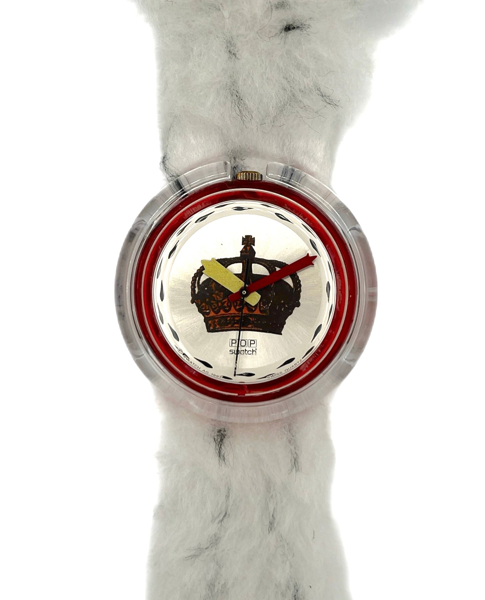 Watch with a red and silver design on a marble surface