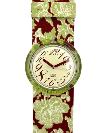 Watch with floral strap on a white background