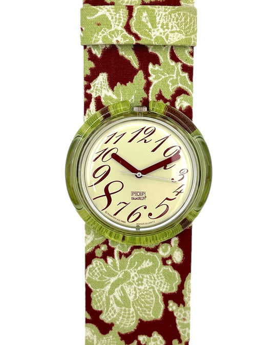 Watch with floral strap on a white background