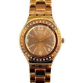 Gold watch with diamond-studded bezel on a white background