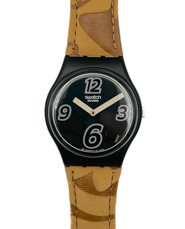 Swatch watch with black dial and tan strap on a white background