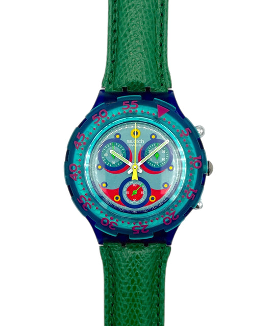 Colorful watch with a green strap on a white background