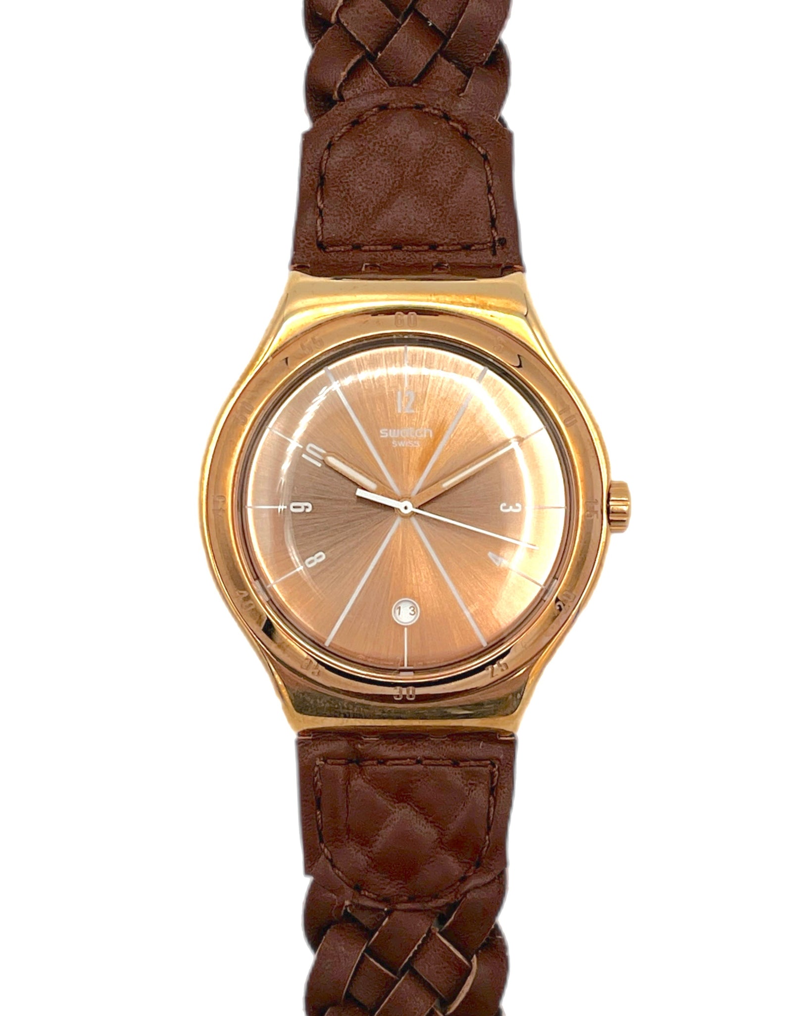 Gold watch with brown braided strap on a white background