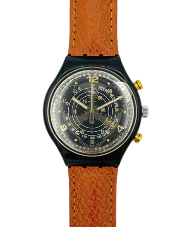 Watch with a brown leather strap on a white background