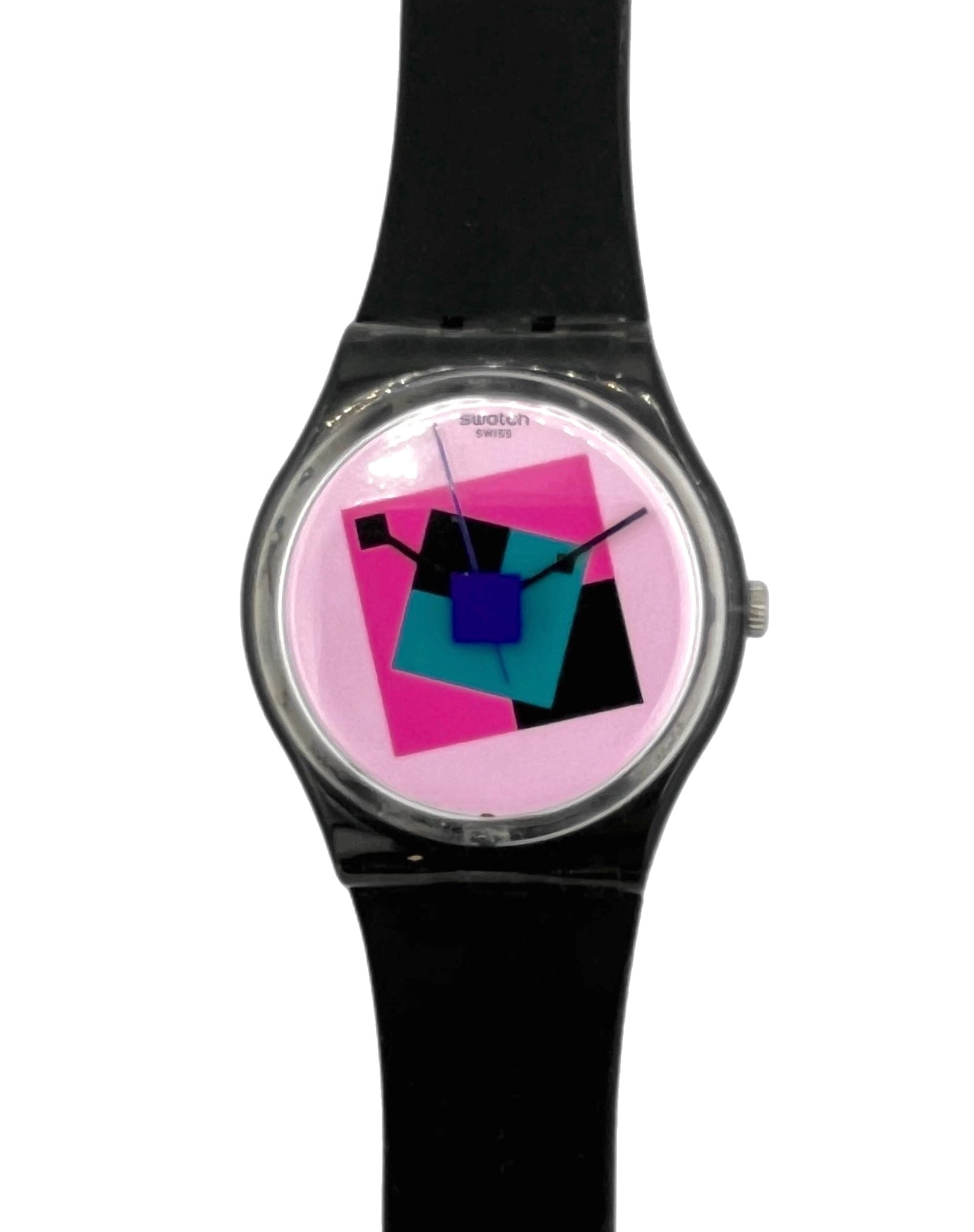 A wrist watch with a black strap and a round silver-tone case, featuring a colorful geometric dial with pink, blue, and black shapes on a light background.
