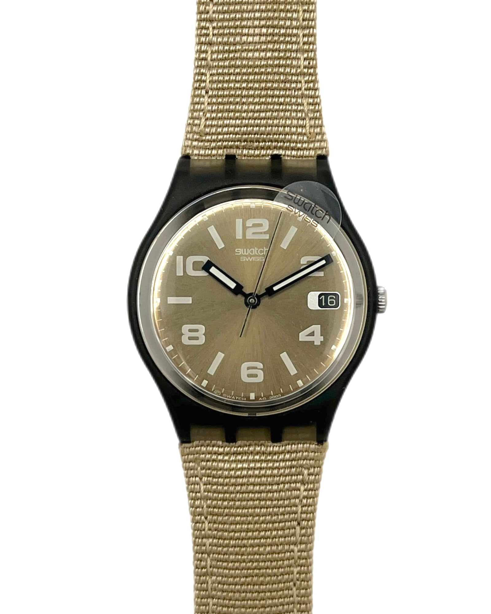 Watch with beige strap and beige dial on a white background