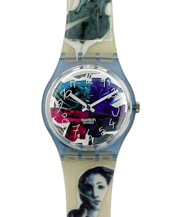 Swatch watch with colorful face design on a white background
