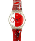 Swatch watch with red face and star-patterned strap on a white background