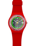 A Swatch wristwatch with a bright red silicone strap and case, featuring a unique dial with a green and red roulette wheel design, white letter markers, and yellow hands on a white background.