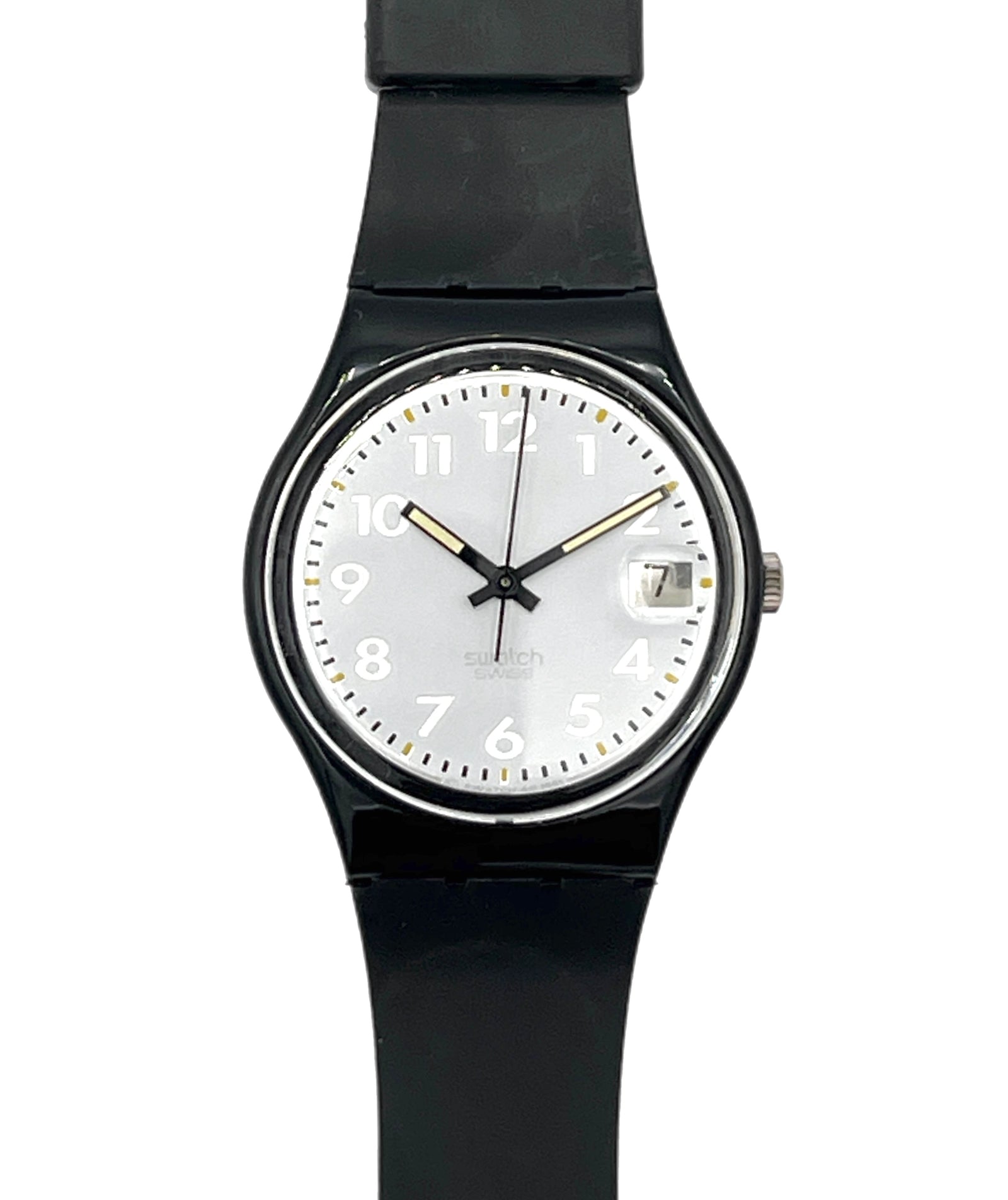 A Swatch wristwatch with a black round case, black strap, and a white dial featuring black Arabic numerals and gold-tone hands.