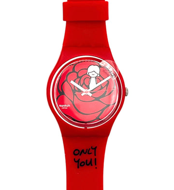 A red silicone watch by Swatch with a rose graphic on the dial and the words 'ONLY YOU!' printed on the strap, shown against a plain white background.