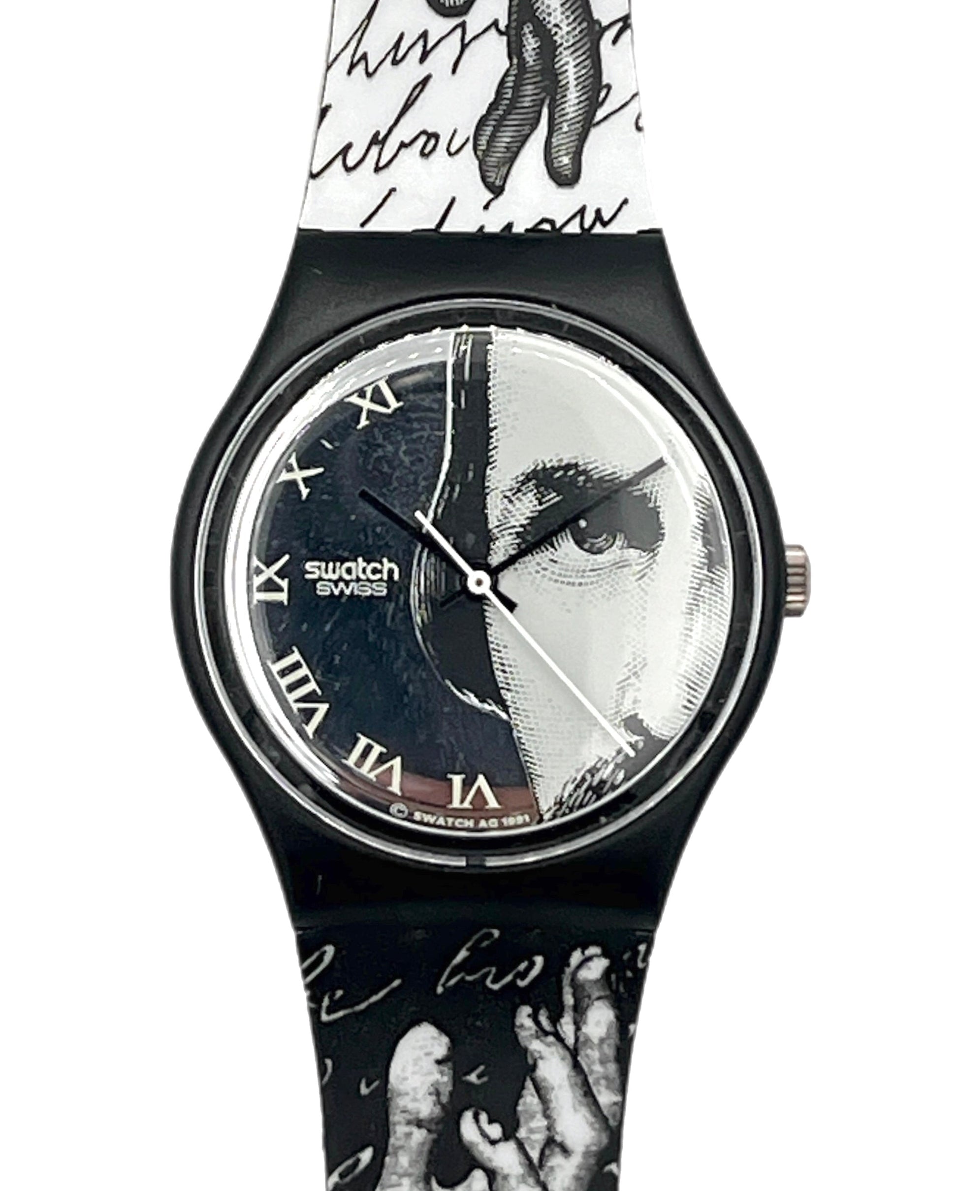 Swatch Swiss wristwatch with a black case and a split-face dial featuring a portrait split vertically. The strap is white and black with script and hand illustrations.