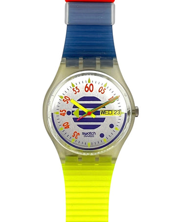A Swatch analog wristwatch with a translucent strap featuring a red top section, a blue upper section, and a bright neon yellow lower section. The watch has a clear case and a white dial with colorful markings.