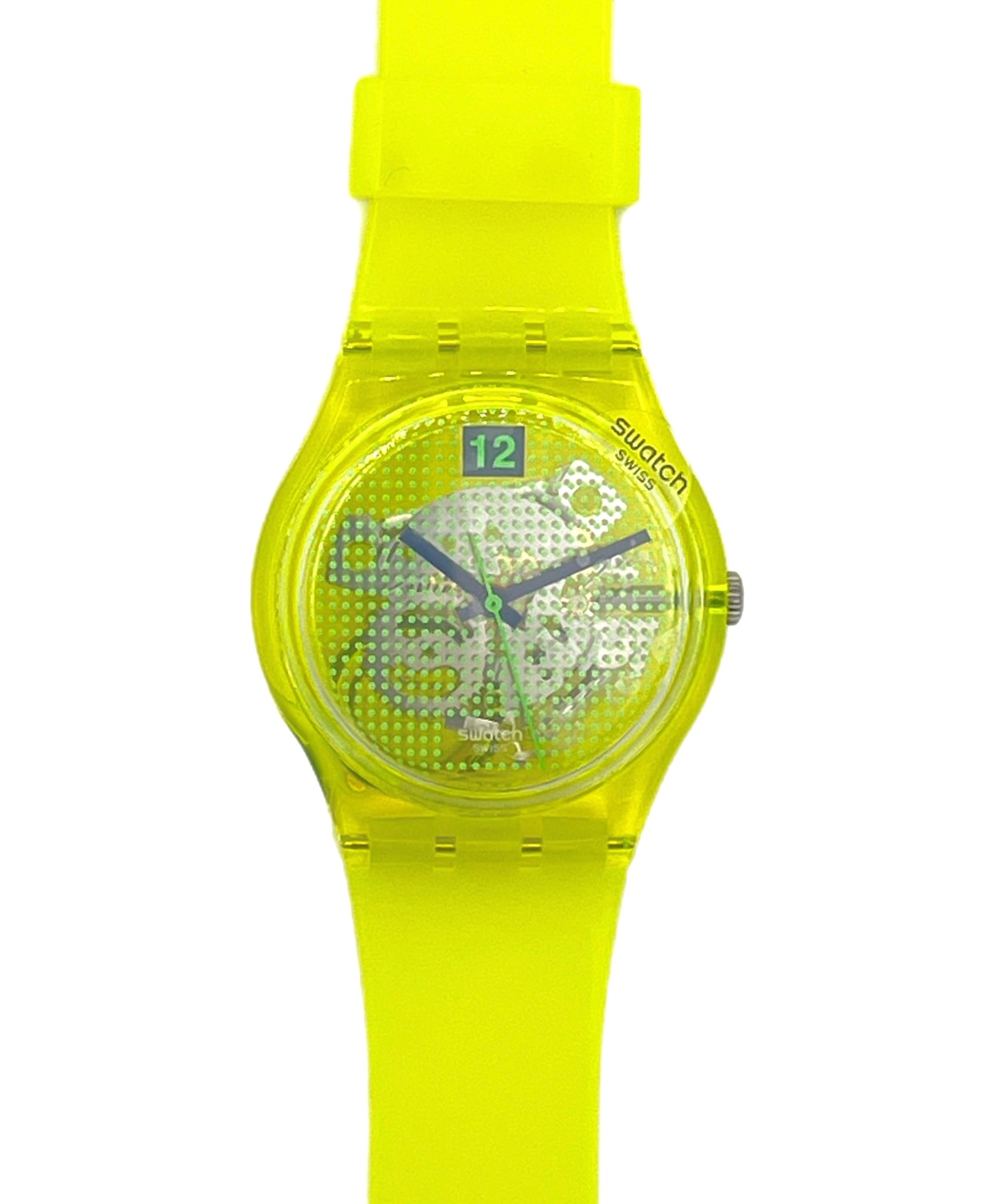 Swatch wrist watch with a translucent neon yellow-green case and matching silicone strap, featuring a patterned dial and a 12-hour display window.