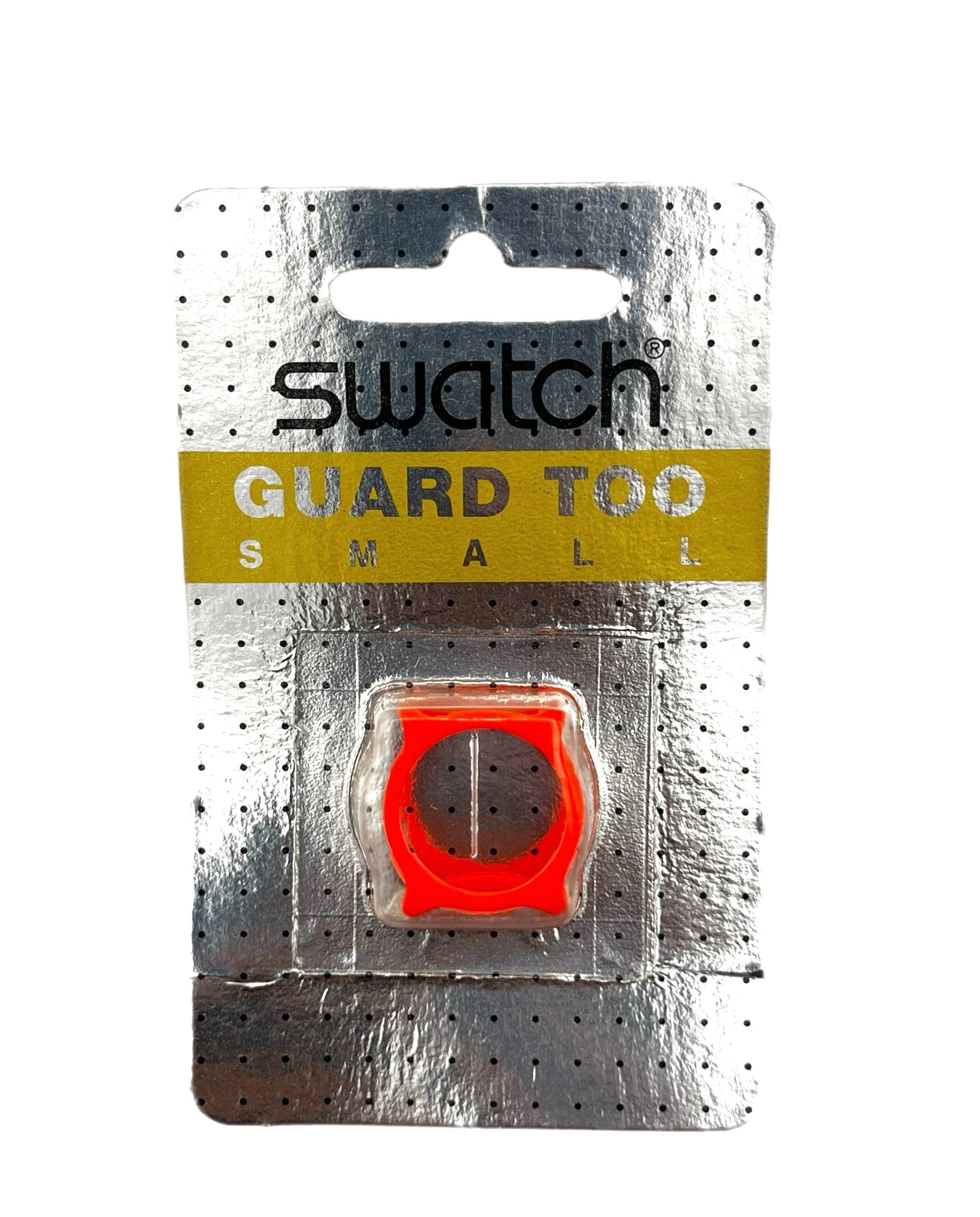 A Swatch Guard Too Small orange-red protective ring accessory in its original silver blister card packaging, shown against a plain white background.
