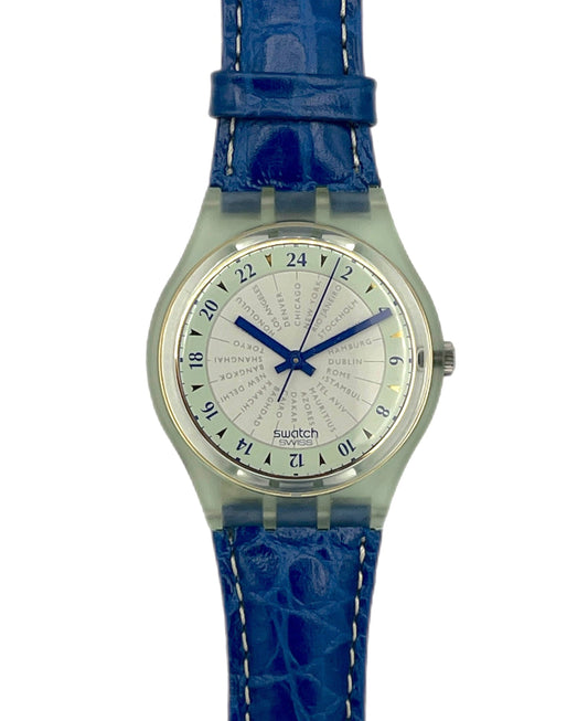 Swatch watch with blue strap and white face on a white background