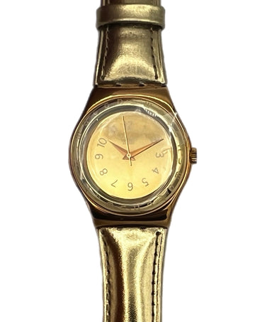 Gold wristwatch on a white background
